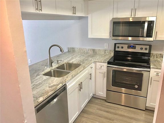 4th image of 5040 Terrace Palms Cir Unit 102