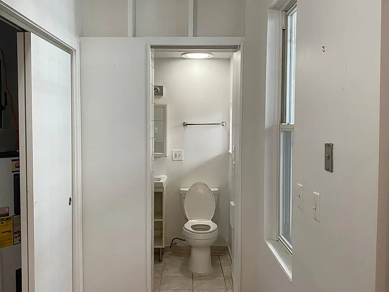 Hall facing bathroom