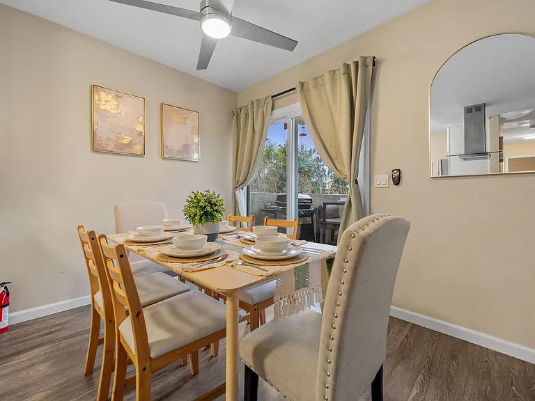 Gather around the table in this inviting dining area, perfect for meals and memories.