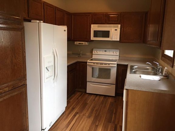 4th image of 5087 Arrowood Ln N