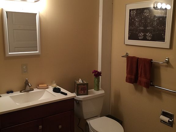 Large bath open to bedroom and hallway