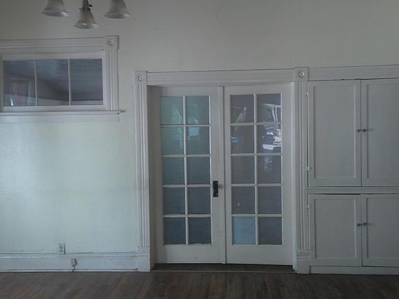 View of dining room. The double glass doors is entrance to t