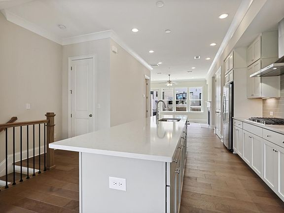 Open floor plan extend to living area and deck