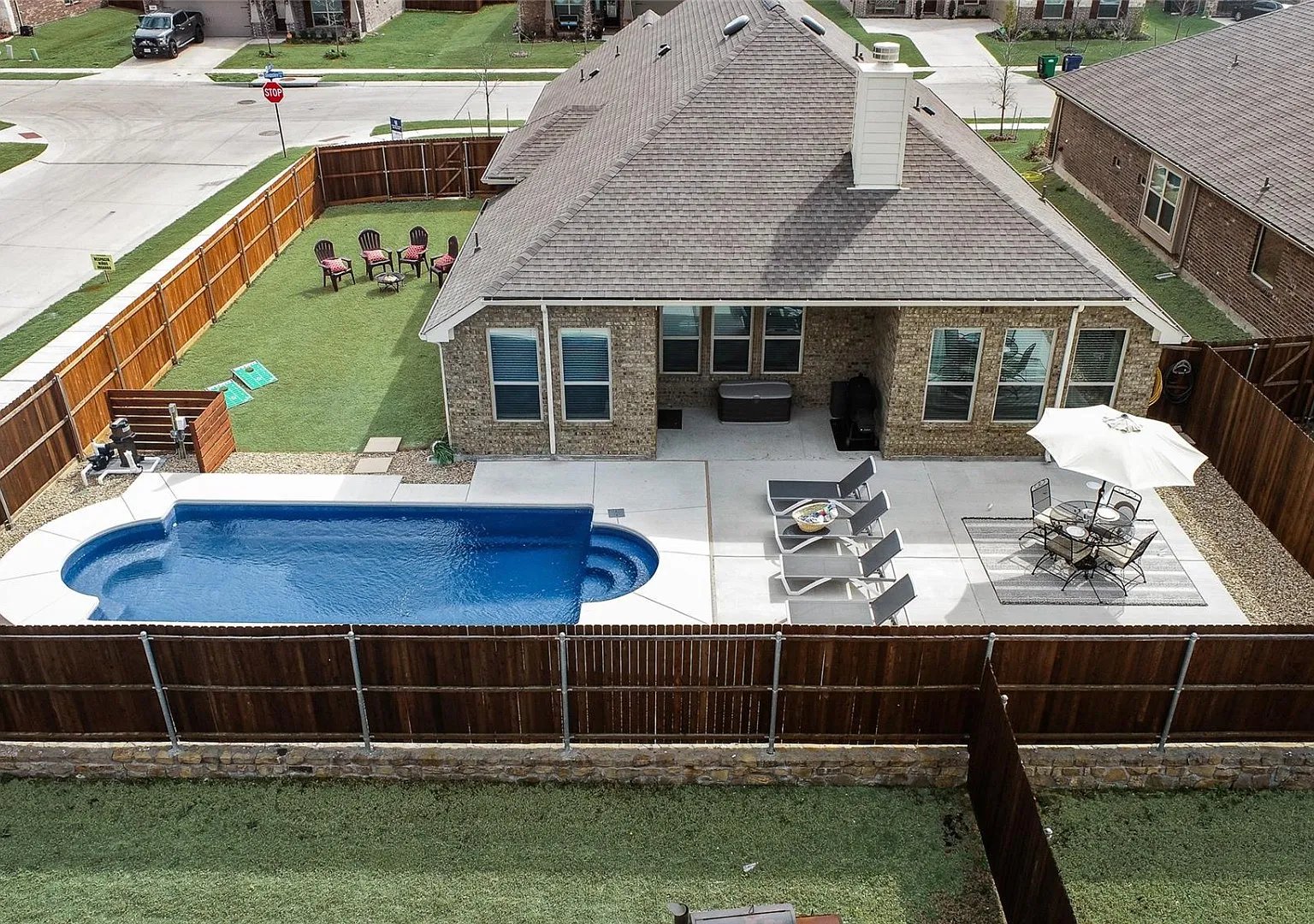 Corner-Lot 4BR in Chamberlain Crossing with Pool, Porch & Vaulted Ceilings 639 Devonshire Ln, Fate — Photo 1