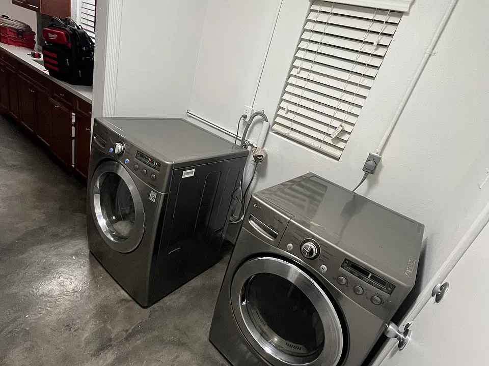 laundry room with washer and dryer