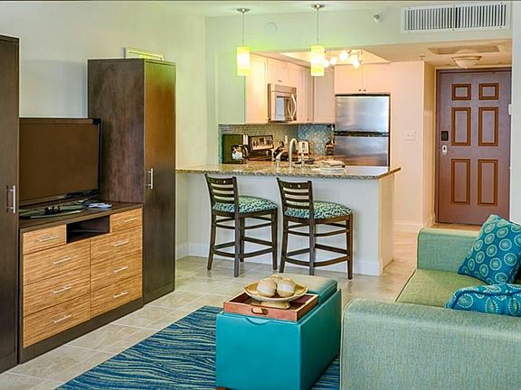 FULL KITCHEN WITH STOVE, OVEN, REFRIGERATOR, AND MICROWAVE