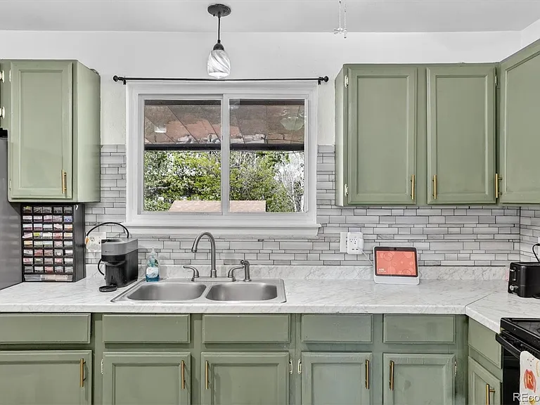 9334 Bellaire St — Photo 5