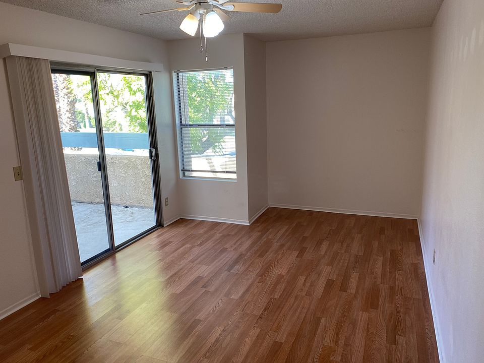 guest bedroom with balcony and attached bath
