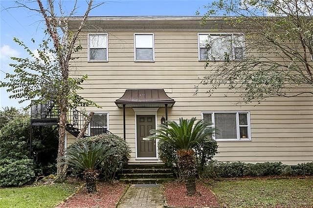 The LOVELY unit is situated in the HEART of the GARDEN DISTRICT and on the CORNER of Coliseum and Eighth Streets - just steps from the PARADE ROUTE, FRESH MARKET, and the street car!