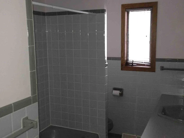 Main Bathroom, includes tub with shower