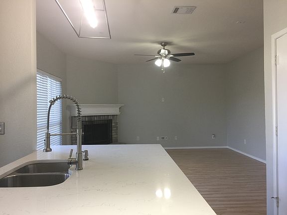 Kitchen view into living rm