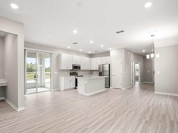 Enjoy a sunny, open living area - Capri bungalow by Highland Homes