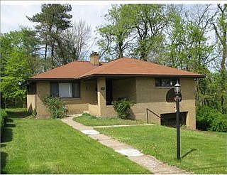 Front of home.  Surrounded by woods!! Private