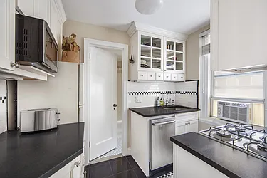 Sold by John J. Grogan & Associates