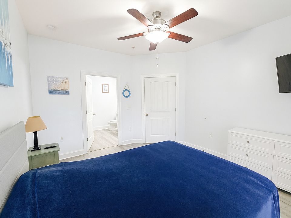 Main bedroom comes with a Queen size premium matress, and a dresser with a flat screen TV