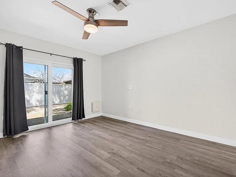 Bedroom with walk out to private patio