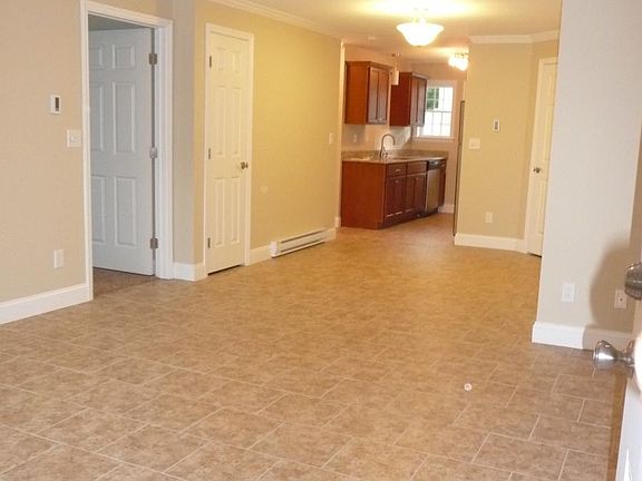 open flowing floor plan - looking from living room to kitchen