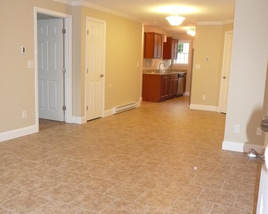 open flowing floor plan - looking from living room to kitchen