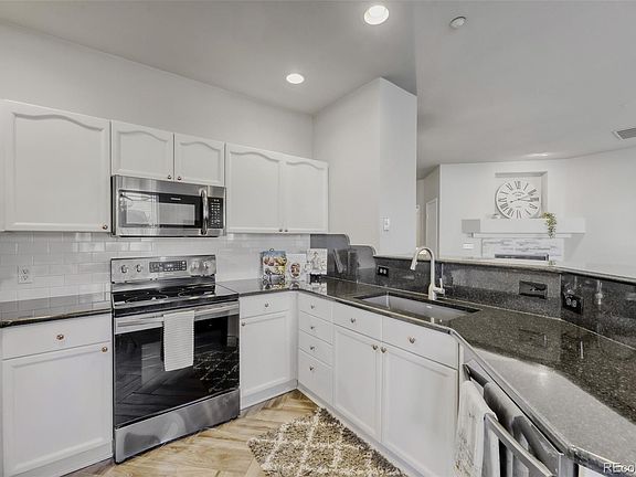 5th image of 8374 S Holland Way #107