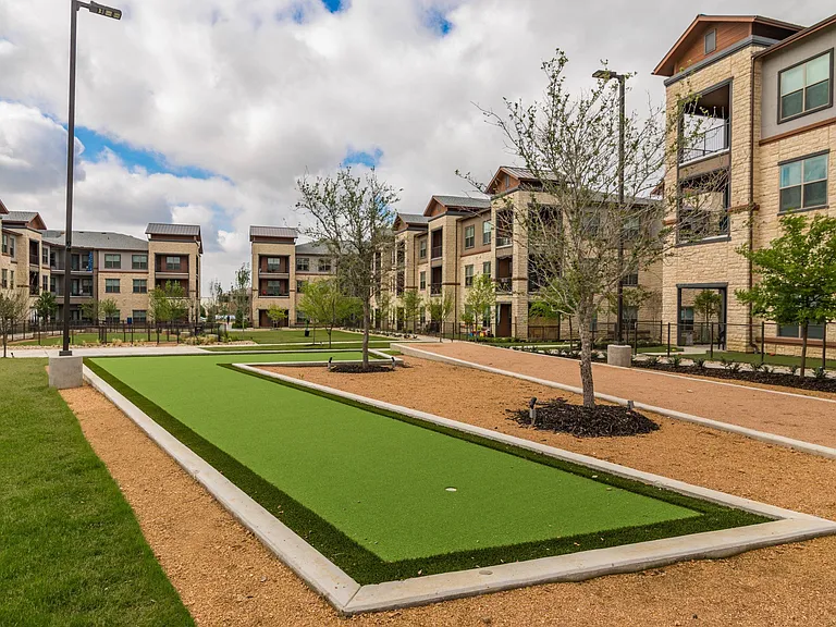 Take your shot at a hole in one on our putting green.