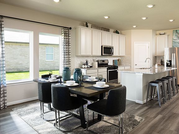 A combined kitchen and dining area make entertaining a breeze.