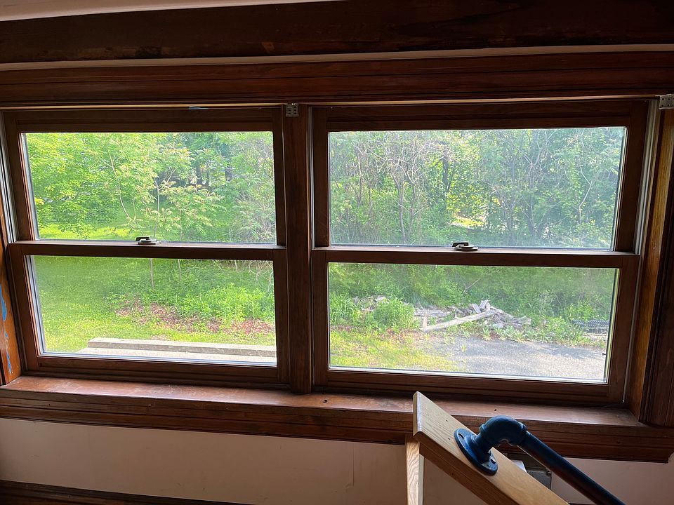 Top of landing, window overlooking parking area