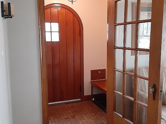 Entry with bench and mailbox