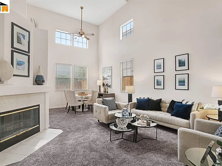 high ceiling living room with staging