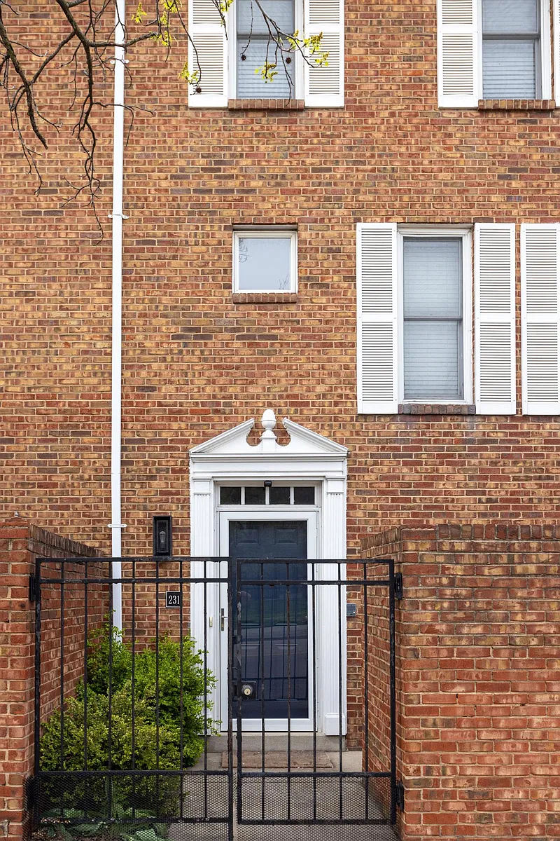Front door - patio behind wall on right - 231 E 2nd St