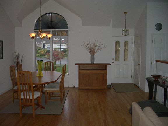 front door, living room, beautiful arch window