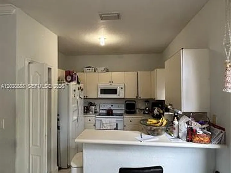 6920 NW 177th St #Q101 — Photo 8