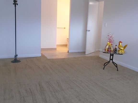 Master bedroom with view of bathroom