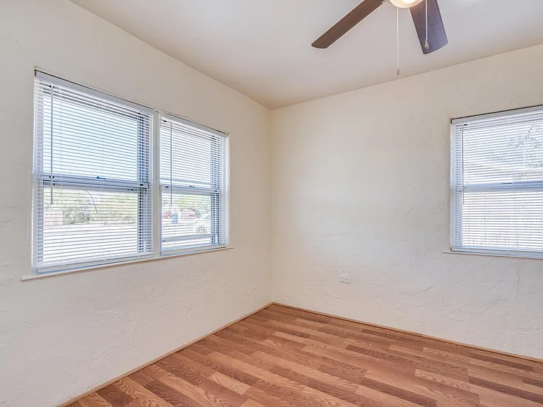 Bedroom 1 double pane windows of front house and side house.