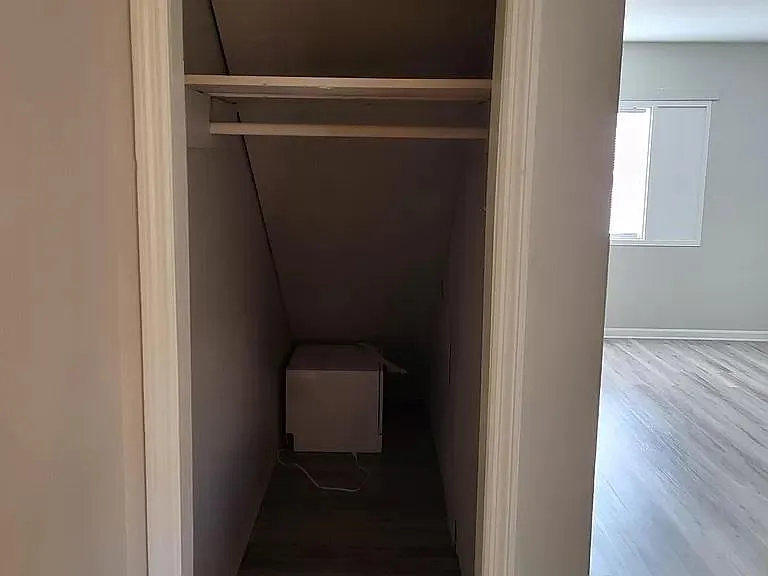 Extra storage area under the stairs