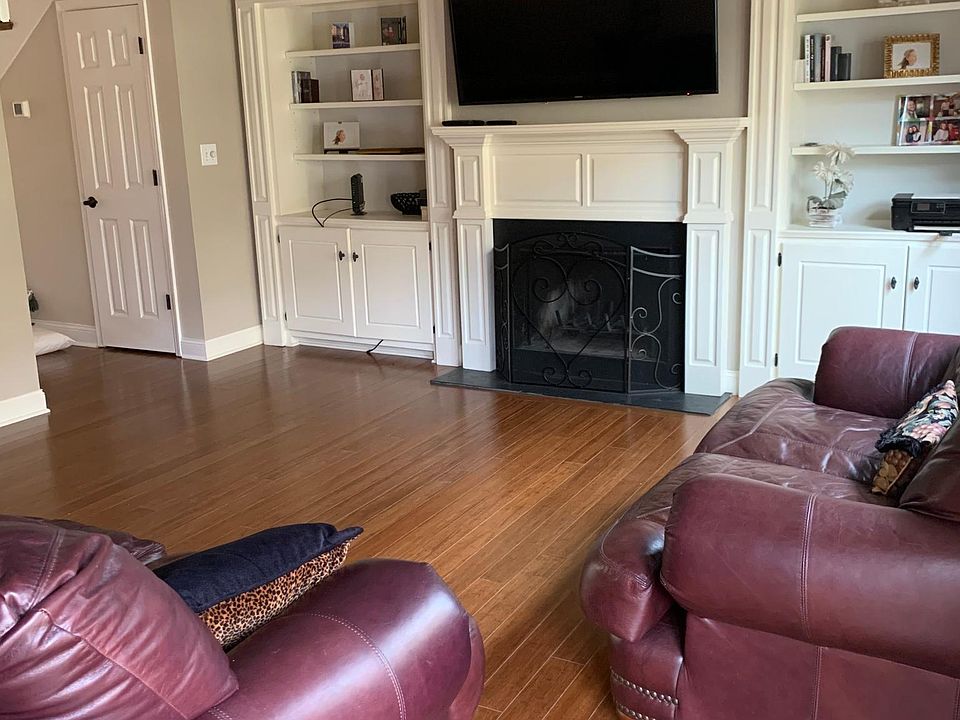 Family Room with fireplace and built-in cabinets