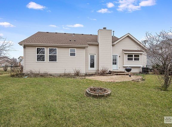 Fenced yard Complete with Brick Paver Patio & Fire-pit