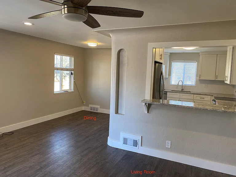 Dining room to the left, with direct access into the kitchen