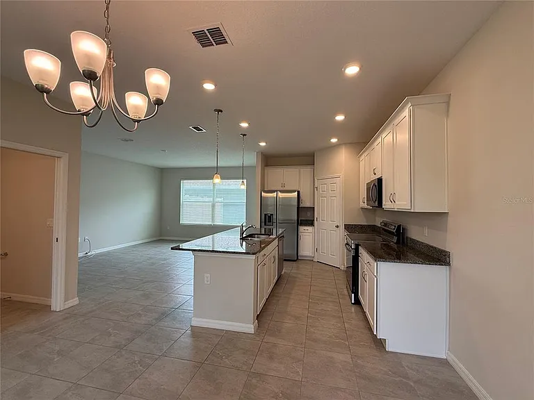 5072 Avalon Park Blvd — Photo 7