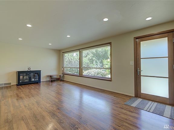 Light and bright, this family room has tons of available space. 