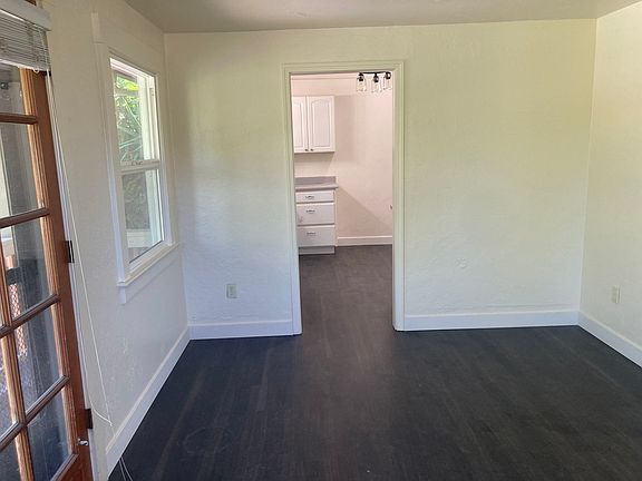 Living room facing kitchen