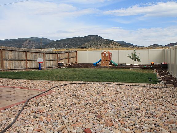 Fenced Backyard with nice grassy area.