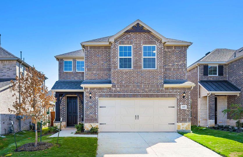 The Nelson, a two-story home with 2-car garage