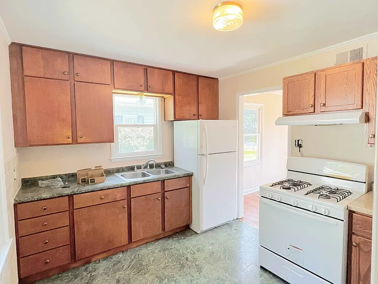 Kitchen has a gas range