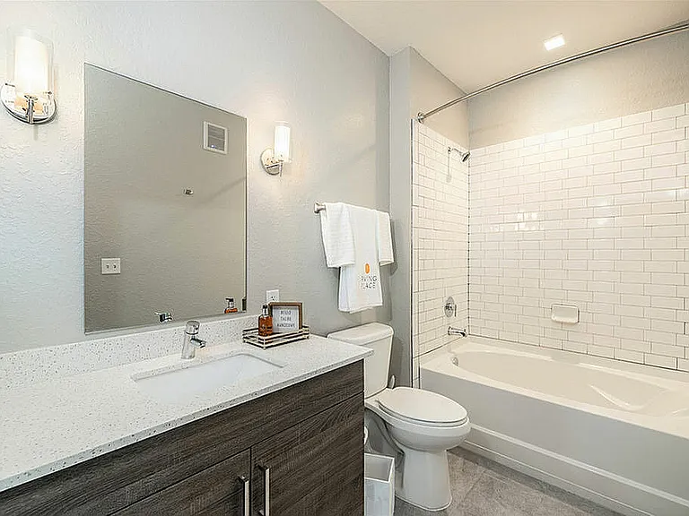 Experience luxury in every detail of this modern bathroom, where design meets functionality.