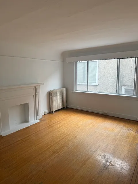 Building Photo - 1305 W 15th Ave #10