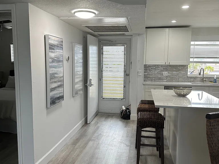 Open concept kitchen with an island, SS appliances