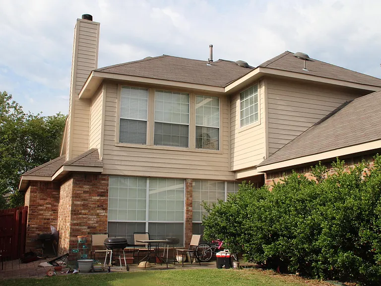 Rear of Home showing backyard area