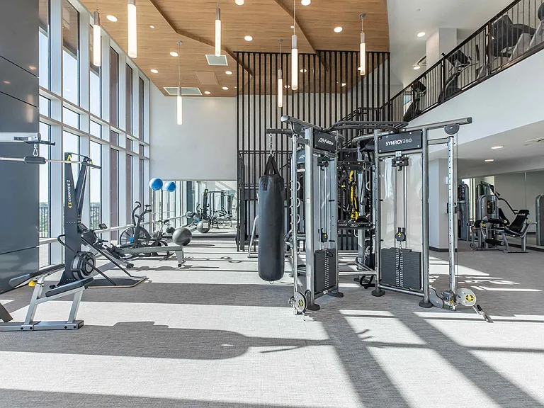 24 Hour Fitness Center with Cardio & Weight Training Equipment