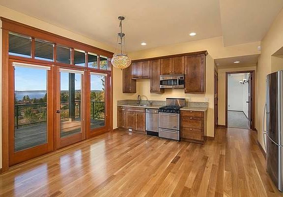 Kitchen. Front door opens onto deck.