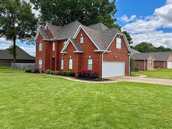 Front Exterior: Corner lot 